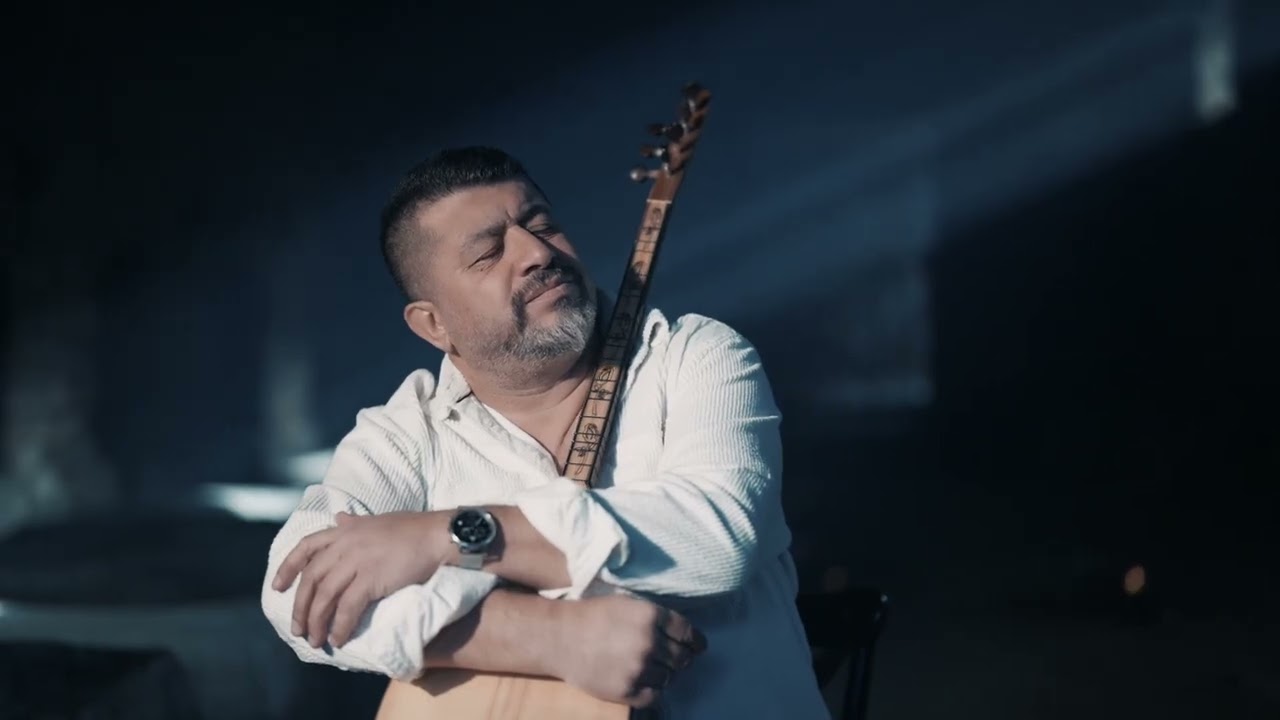 Al Almanın Dalında Şarkı Sözleri – Kutsal Evcimen