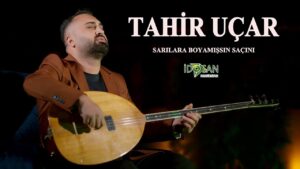 Sarılara Boyamışsın Saçını Şarkı Sözleri – Tahir Uçar
