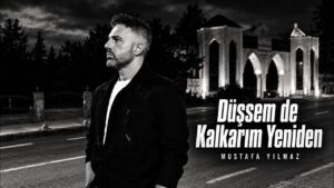 Düşsem De Kalkarım Yeniden Şarkı Sözleri – Mustafa Yılmaz